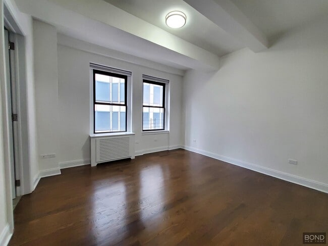 Building Photo - 145 W 55th St Unit 12E Rental