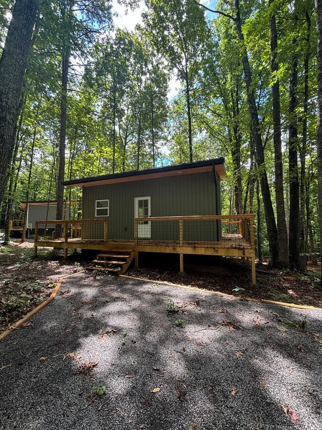 Building Photo - Cozy, Modern Tiny Home with Wrap-Around Po...