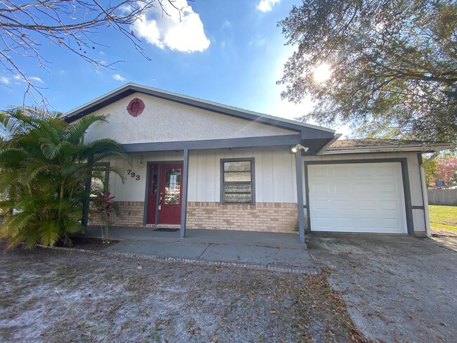 Building Photo - 2/2 home with garage - tile on inside with...