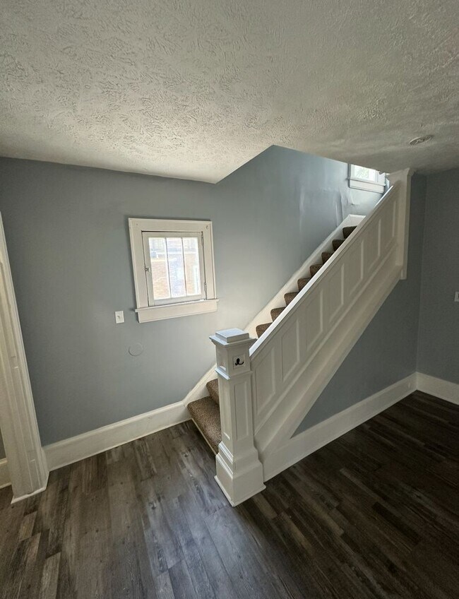 Photo - 4 Bed / 1 Bath Updated Floors & First-Floor Bedroom!