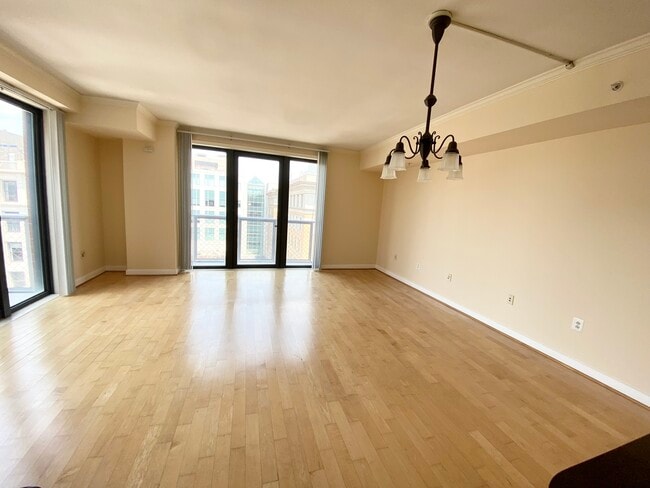 Living room in penthouse corner unit - 616 E St NW Unit #1219