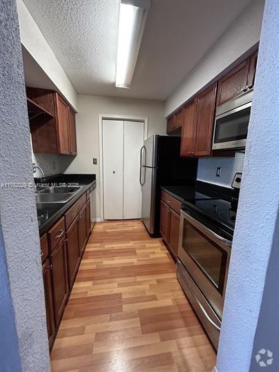 Building Photo - 755 Riverside Dr Unit 1330 Rental