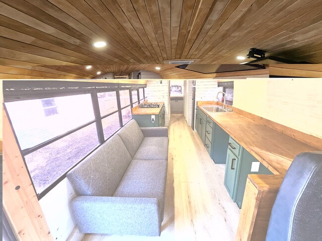 Ample counter space with seating for two at the built incounter - 2450 44th St S Unit Skoolie