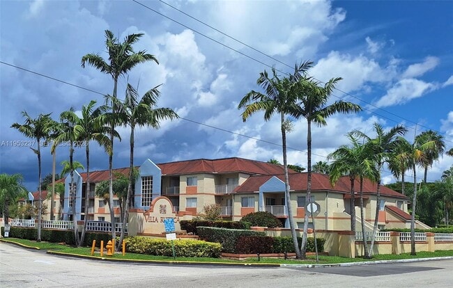 Building Photo - 18810 NW 57th Ave Unit 104