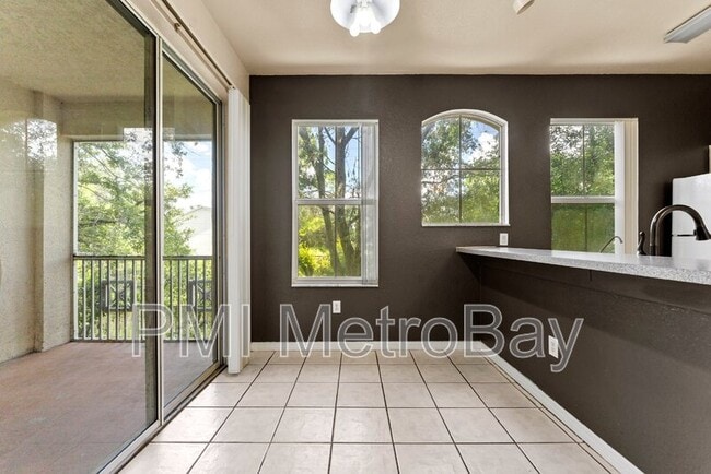 Building Photo - 5039 Sunridge Palms Dr Unit 204