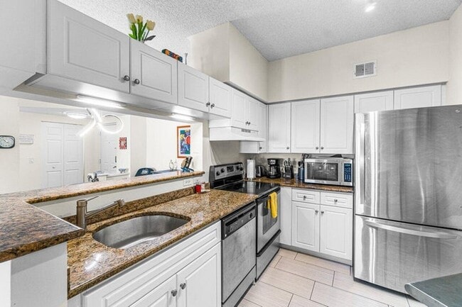 Building Photo - 1408 Tuscany Way Unit 1408