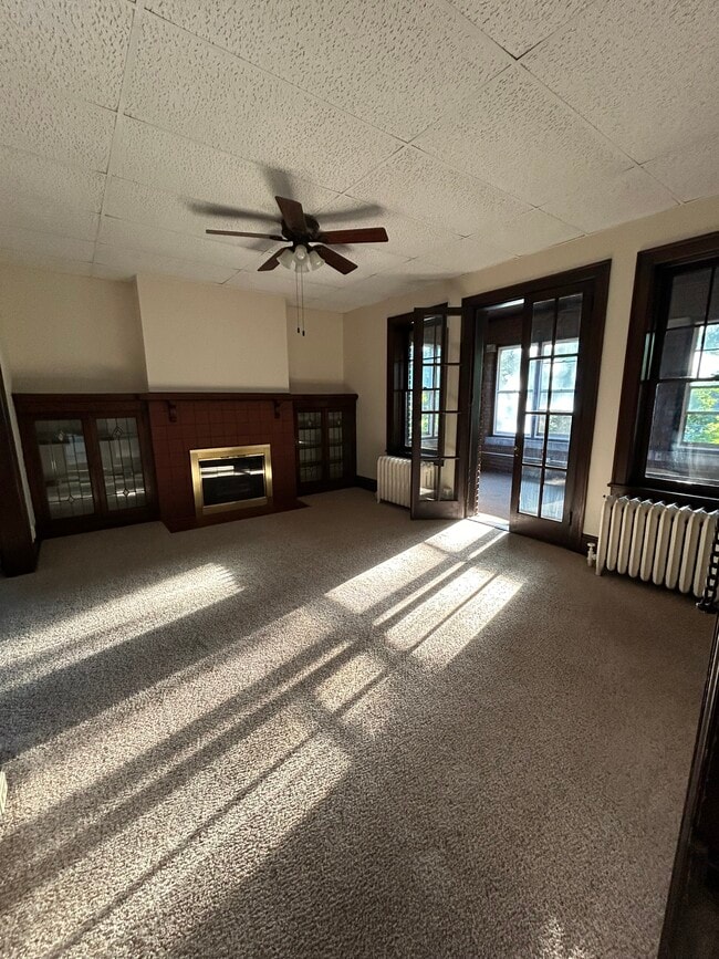 Lv Rm w/built in book shelves - 417 2nd Ave SE Apartments Unit Upper