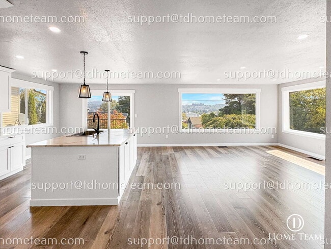 Photo - "Charming 4-Bedroom Home with Scenic Views & Finished Basement in Renton!"