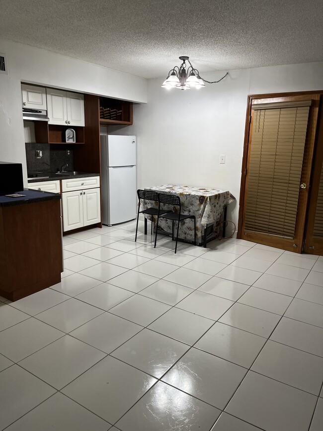 Photo - 5033 NW 7th St Condo Unit Moon towers