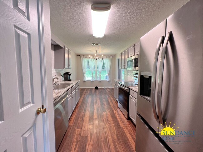 Photo - Spacious 3-Bedroom Home with Solar Panels & Lawn Maintenance Included in South Crestview
