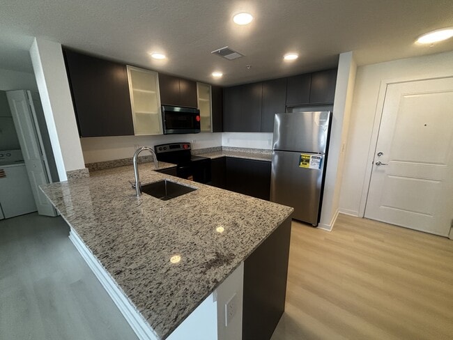 Building Photo - 5563 Millennia Park Dr