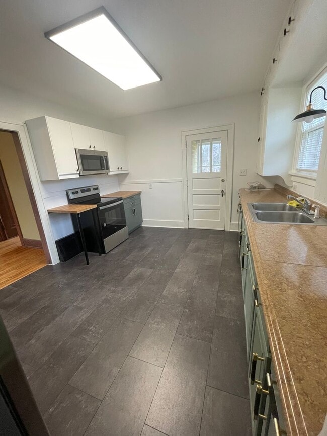 Photo - Four Bedroom Farmhouse on Three Acres