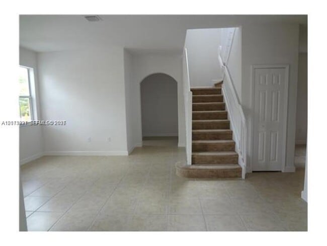 Building Photo - 10012 NW 7th St Unit 216