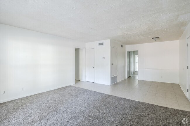 3BR, 2BA - 1266SF - Living Room - Villas At Panthersville Apartment Homes*