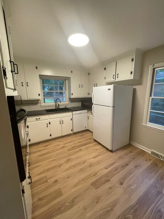 Updated kitchen with new counter, sink, oven and cooktop - 2112 Kilburn Rd