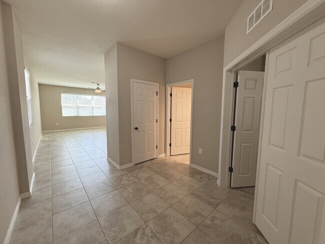 Photo - Spacious 4-Bedroom Retreat with additional office/den in the Heart of Trinity!