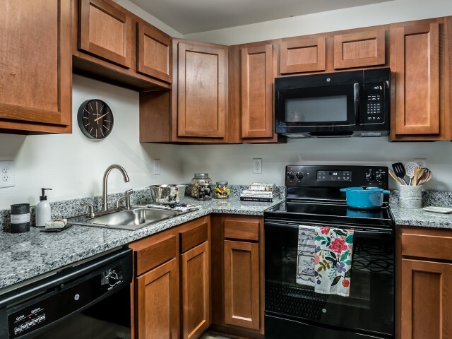 Cook in style with granite countertops and modern appliances at The Preserve at Tuscaloosa.
