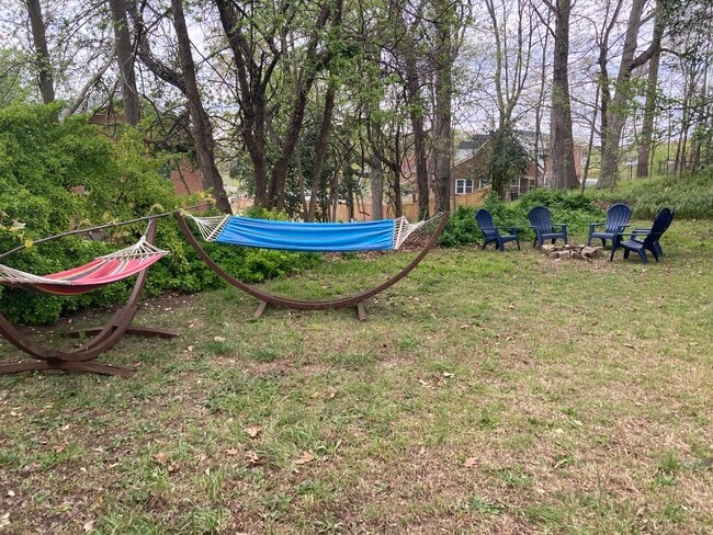 Large backyard with space to hang out and relax. Fire pit, strings of lights to enjoy at night.