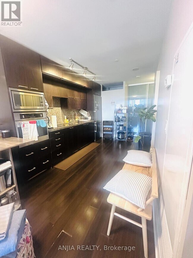 Photo - 120 Harrison Garden Blvd Unit 830