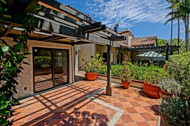 Photo - PRIME POOLFRONT LOCATION & CLOSE TO MAIN GATE! BRIGHT & SPACIOUS, END-UNIT POOLFRONT TOWNHOUSE W/...