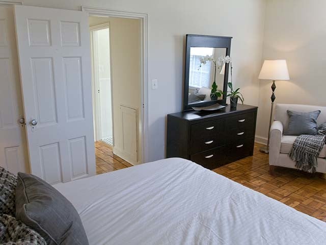 Bedroom with hard surface flooring