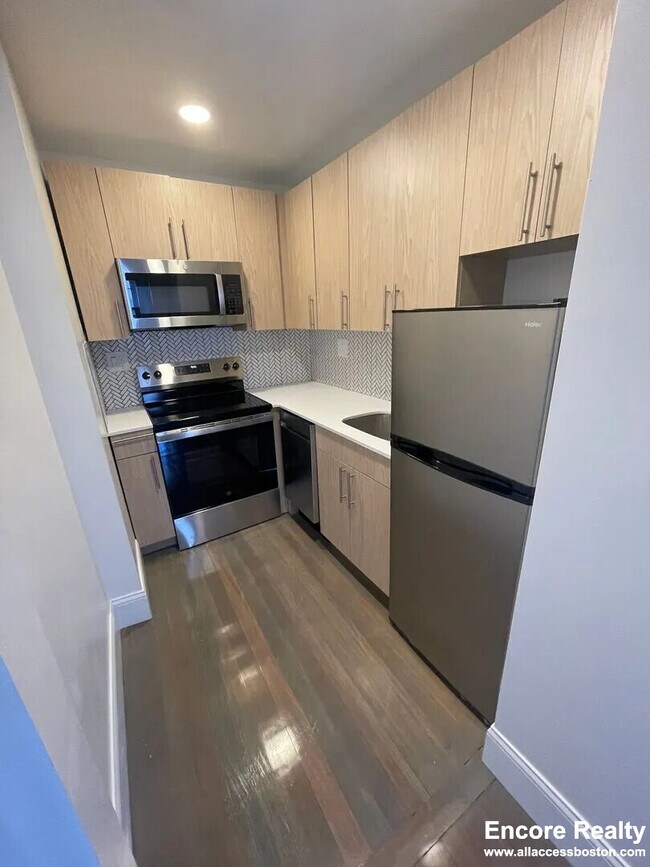 Photo - 457 Centre St Unit 210