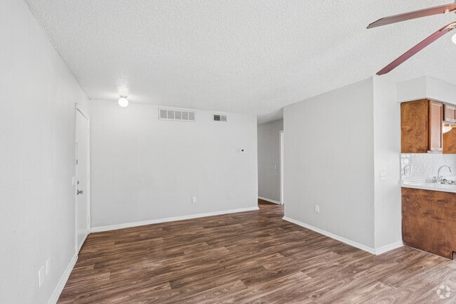 4BR, 2BA - 1,077SF - Living Room