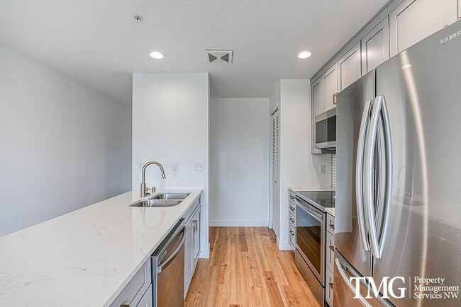 Photo - Top-Floor 2BD/2BA Condo w/ Stunning Park Views & Utilities Included Unit 704