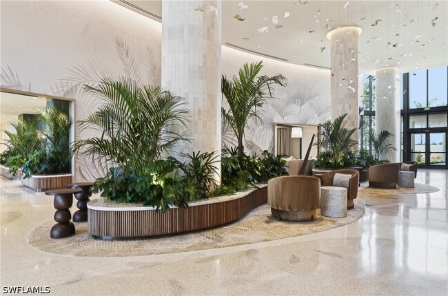 Building Photo - 5100 Seagrass Blvd Unit 306