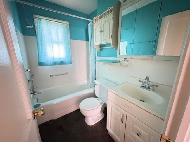 Photo - Charming 2-Bedroom Brick Home with Central Air, Garage & Spacious Backyard