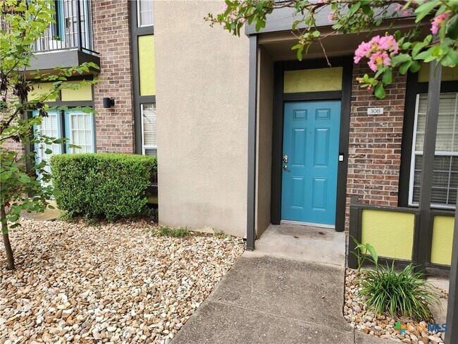 Building Photo - 7685 Northcross Dr Unit 308