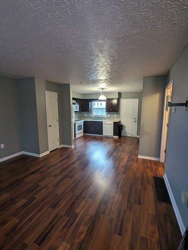 Living room/Kitchen - 1075 Raintree Dr Unit Raintree  1