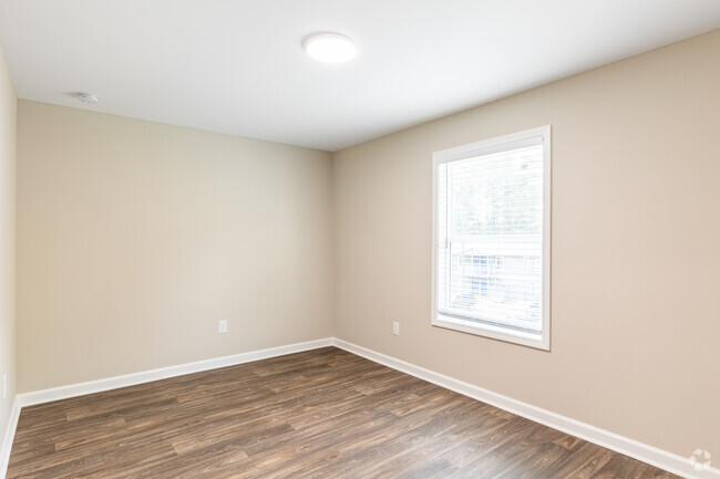 2BR, 1BA - 900SF Primary Bedroom - Langley Place Apartments