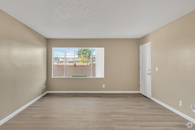 2BR, 1BA - 850SF - Living Room - Regency Apartments
