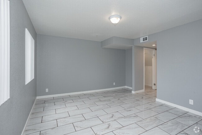 2BR, 2BA - 900SF - Living Room - Emerald Terrace Apartments