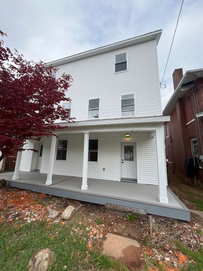 Building Photo - A real stunner! The full renovation is the first thing you'll notice..