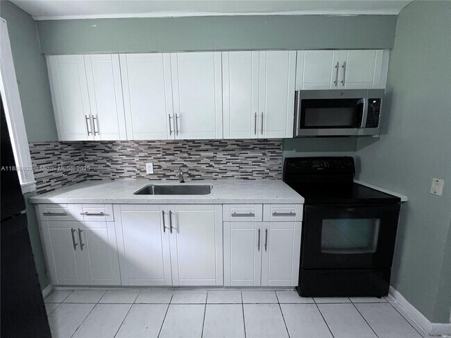 Photo - 1572 NE 135th St Unidad 0