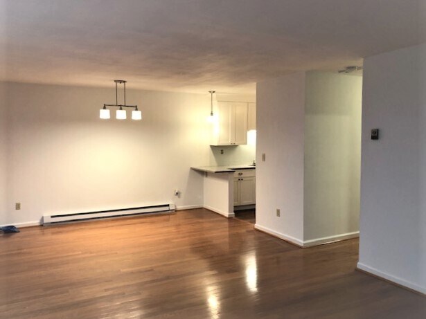 Living room and dinning area with newer lighting - 157 1/2 Kings Hwy Unidad L