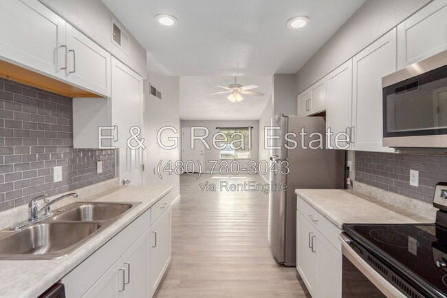 Building Photo - 4530 E Camino Cir Unit 2