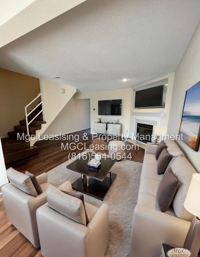Photo - Spacious Townhome in Lee's Summit with Fireplace, Garage, and In-Unit Laundry
