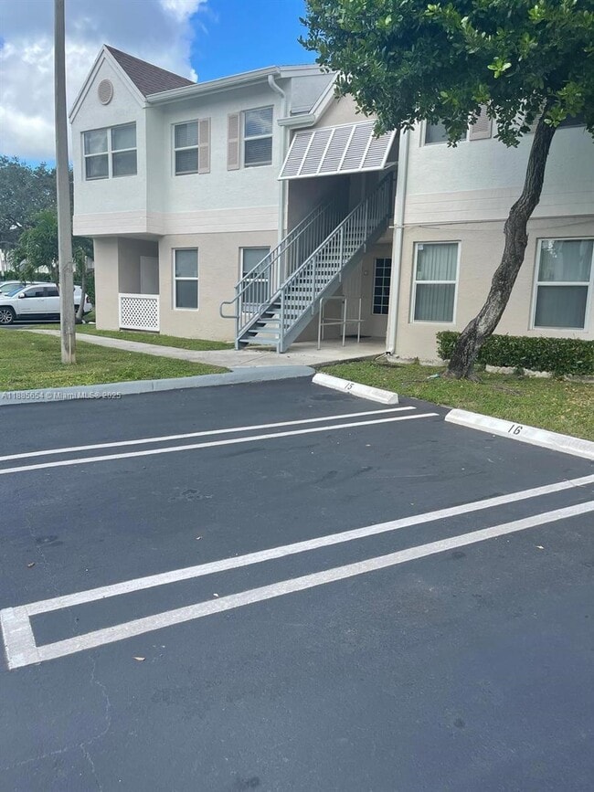 Building Photo - 17565 NW 67th Pl Unit A8
