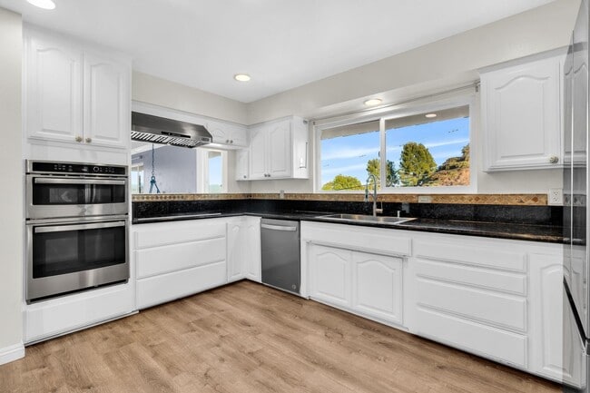 Photo - 4 Bedrooms, 3 Bathroom, Two Story Home With Pool