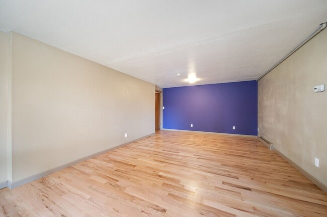 Living Room empty 1 - 8090 W 63rd Ave