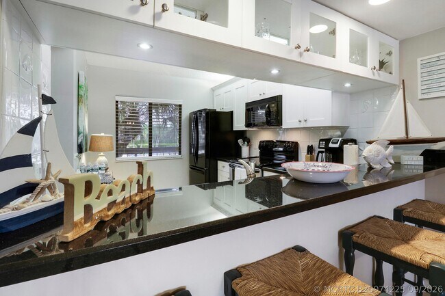Building Photo - 1601 Marina Isle Way Unit 202