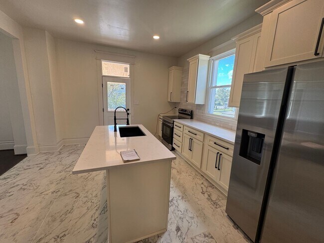 Photo - Updated 3-Bedroom, 2-Bath with all new app...