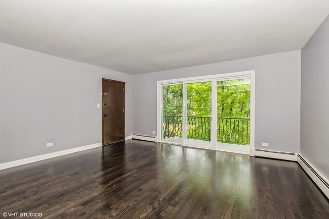 Photo - 7755 S Roberts Rd Condo Unit 5