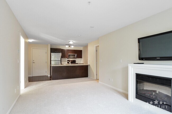 Photo - Introducing a charming 2 bed, 2 bath condo with a spacious patio fit for entertaining - Located ... Unit 209