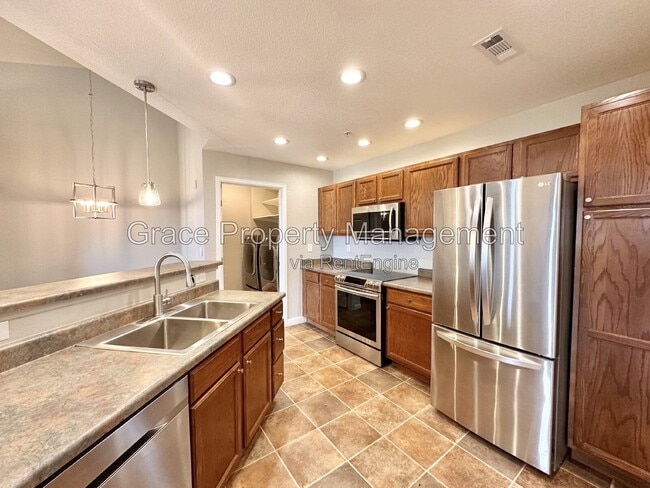 Photo - 5735 N Genoa Way Unit 306