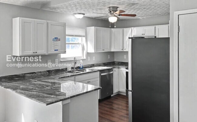 Photo - 3 Bed, 2 Bath Home with Garage / Pet-Friendly / Available Now!