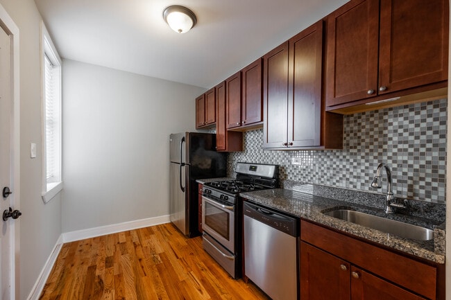 Building Photo - 4409 N Wolcott Ave Unit A2